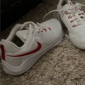 Red and white Nike volleyball shoes